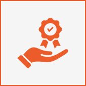 Hand holding a quality assurance badge.